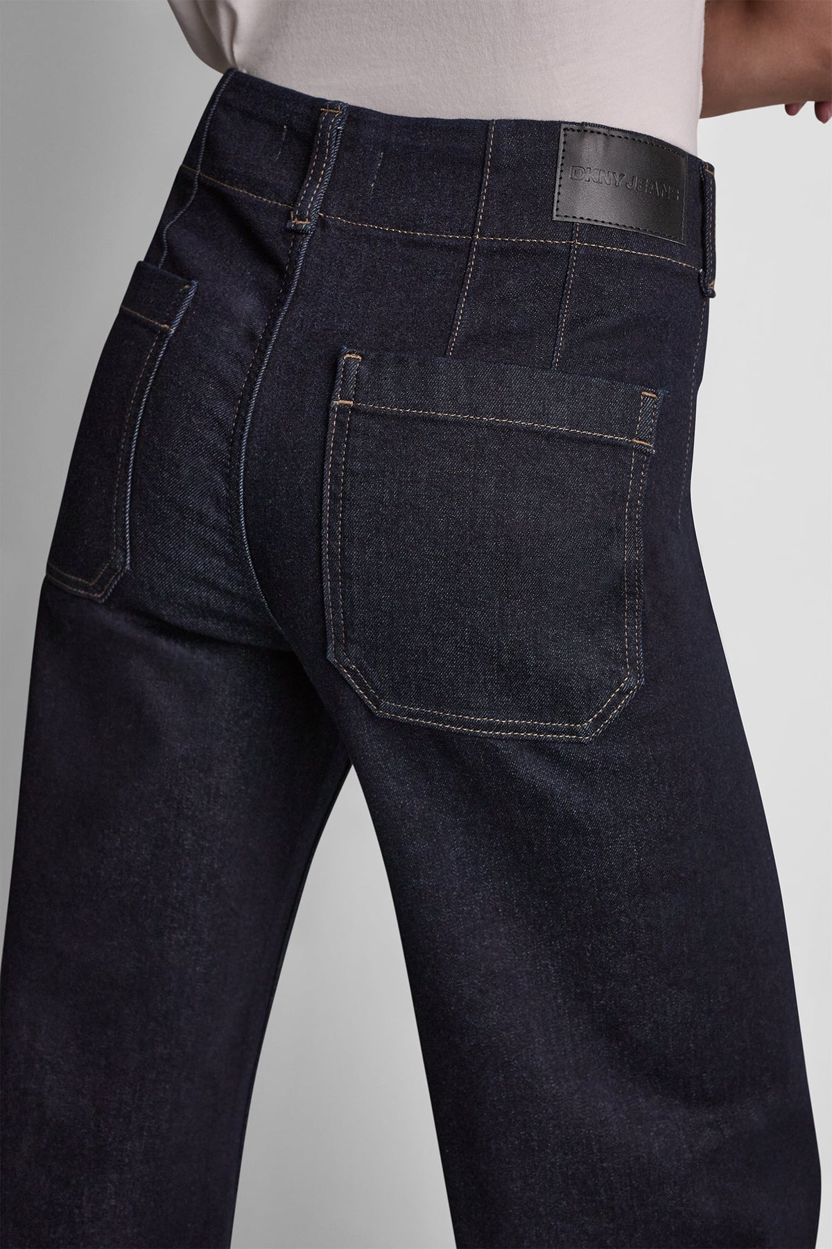 HIGH-RISE PINTUCKED WIDE-LEG JEAN